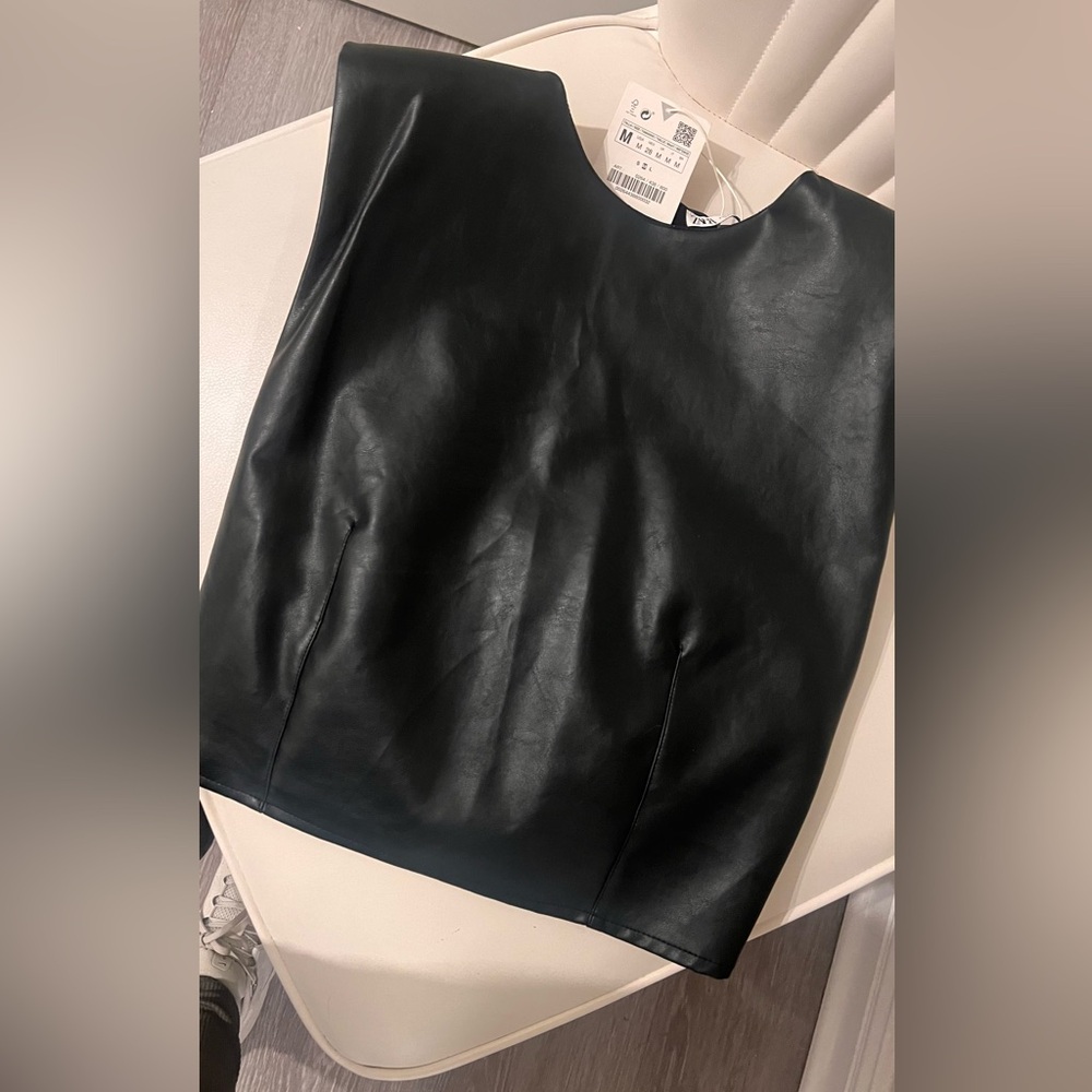 Leather top w/ padded shoulders